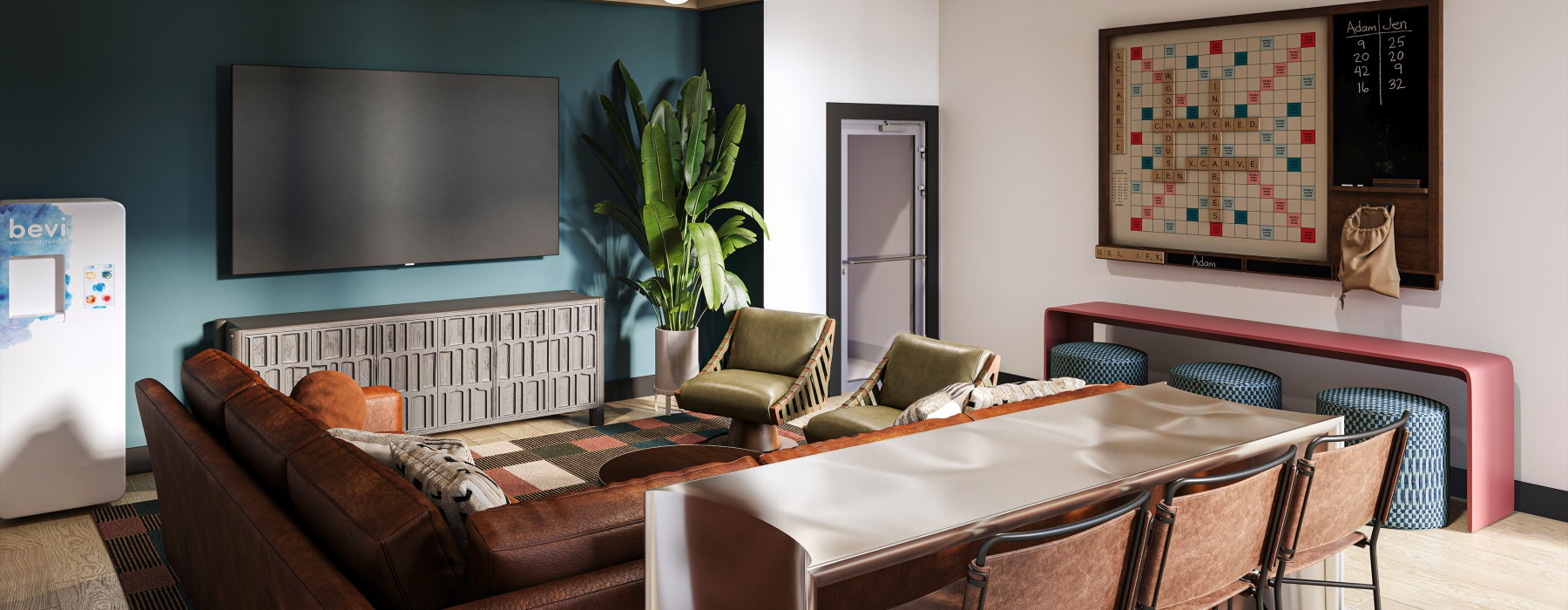 room with two green chairs and large plant