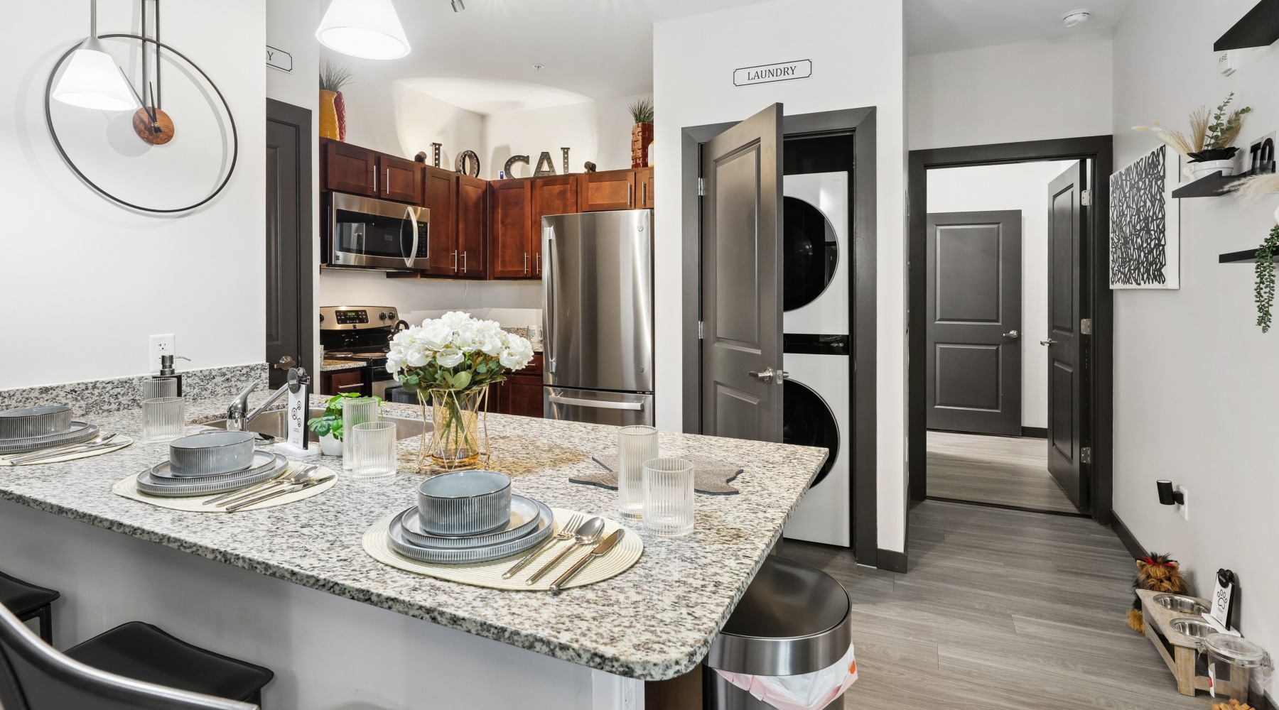 a kitchen with wood cabinets